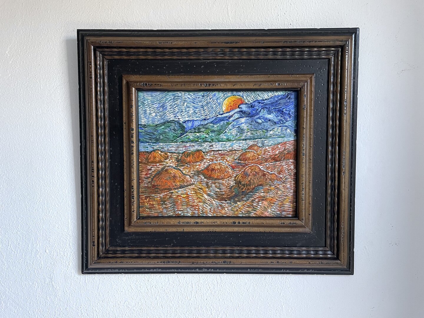 small replica of Van Gogh's Landscape with Wheat Sheaves and rising Moon with vintage frame