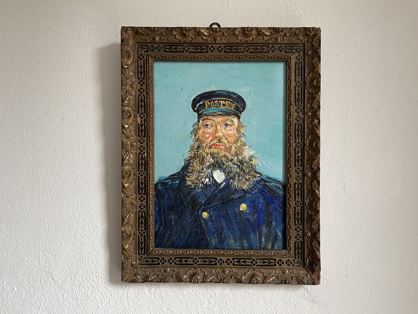 small replica of Van Gogh's Portrait of the Postman Joseph Roulin with antique Italian frame